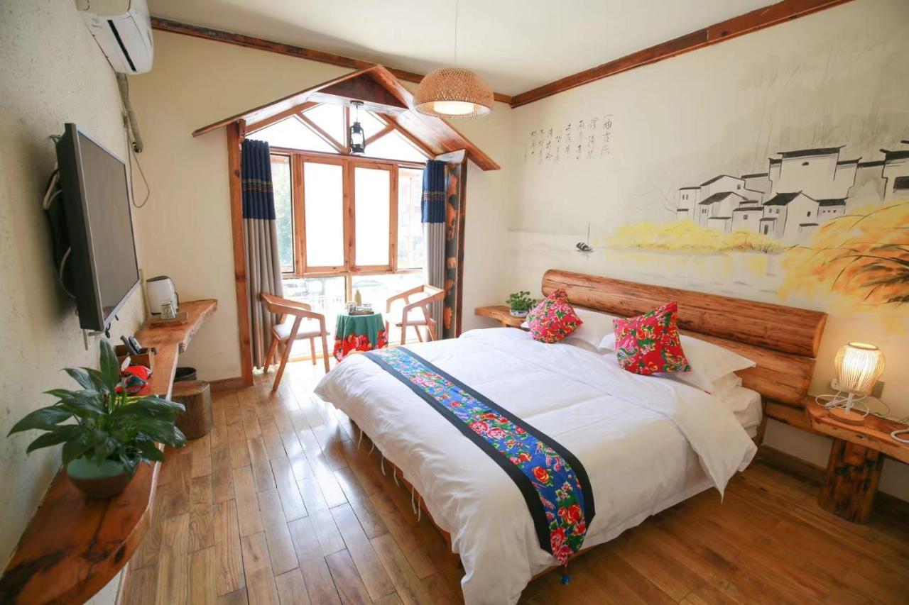 Tea House Hotel Zhangjiajie Buitenkant foto