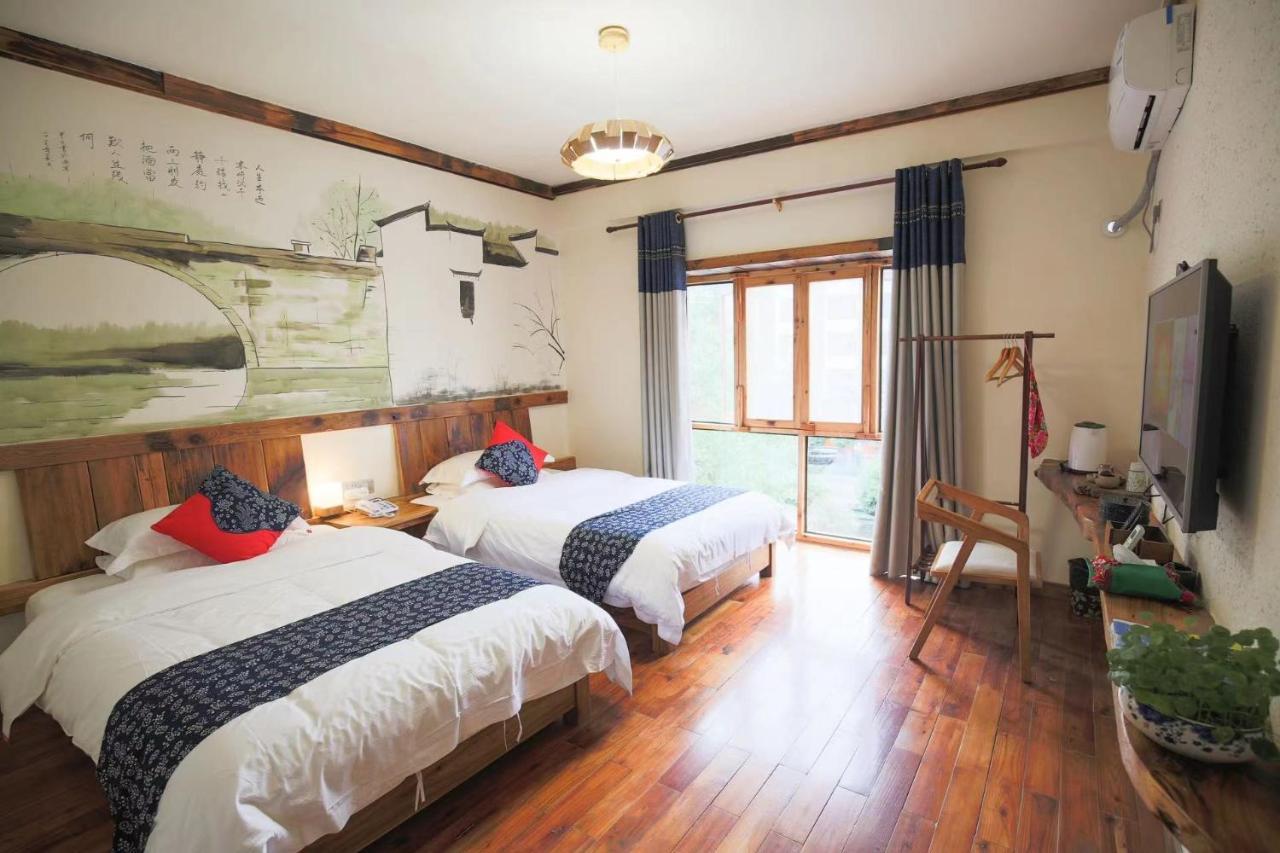 Tea House Hotel Zhangjiajie Buitenkant foto