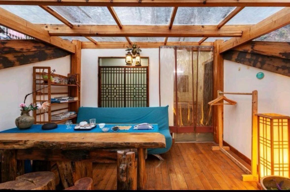 Tea House Hotel Zhangjiajie Buitenkant foto
