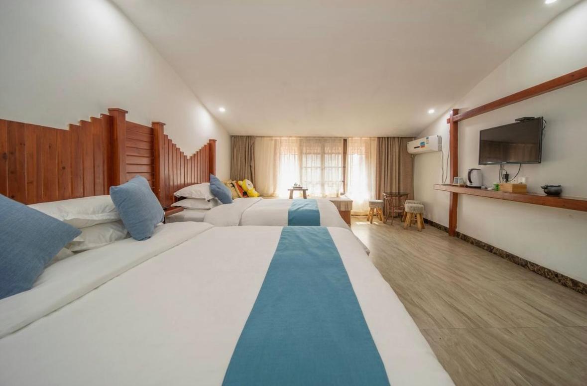 Tea House Hotel Zhangjiajie Buitenkant foto