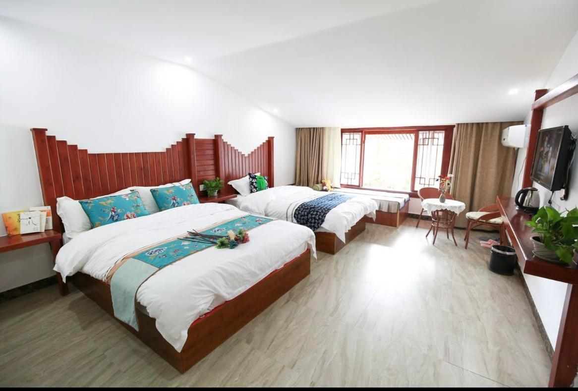 Tea House Hotel Zhangjiajie Buitenkant foto