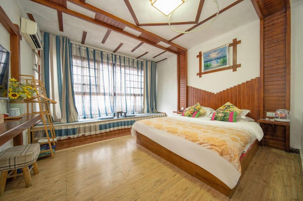 Tea House Hotel Zhangjiajie Buitenkant foto