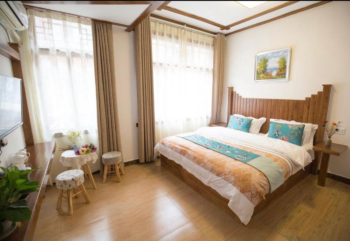 Tea House Hotel Zhangjiajie Buitenkant foto