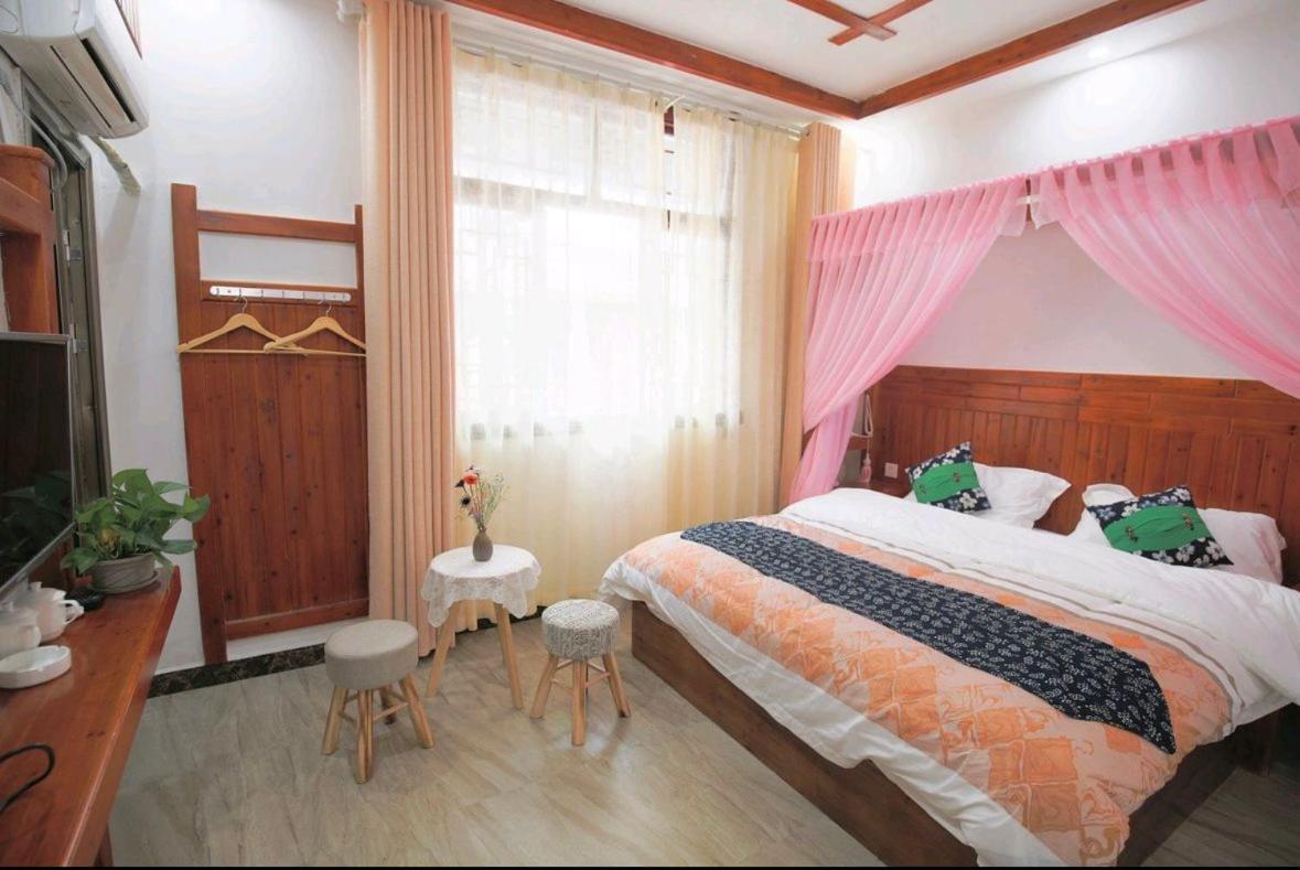 Tea House Hotel Zhangjiajie Buitenkant foto